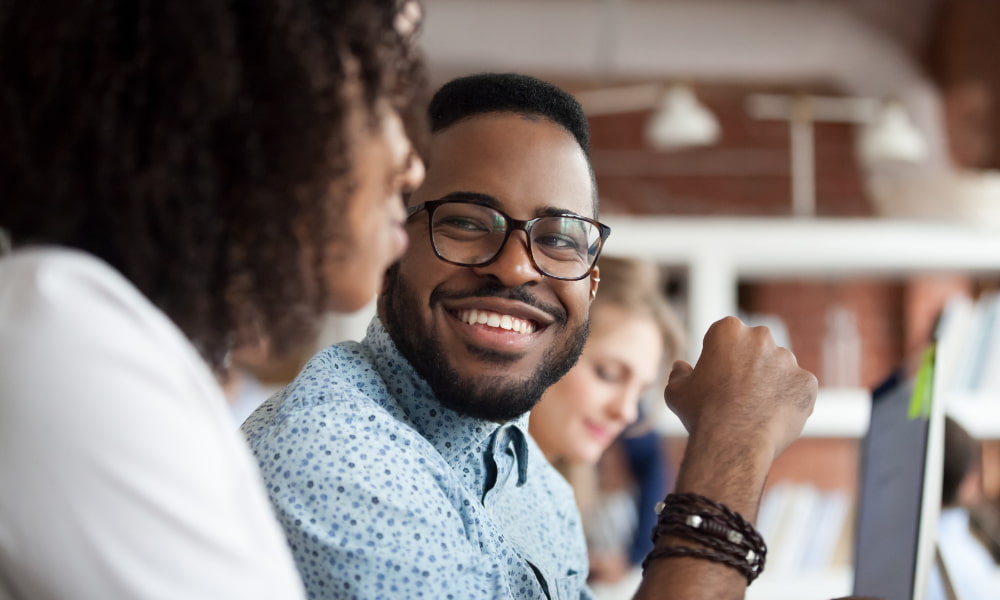 happy employees talking to each other